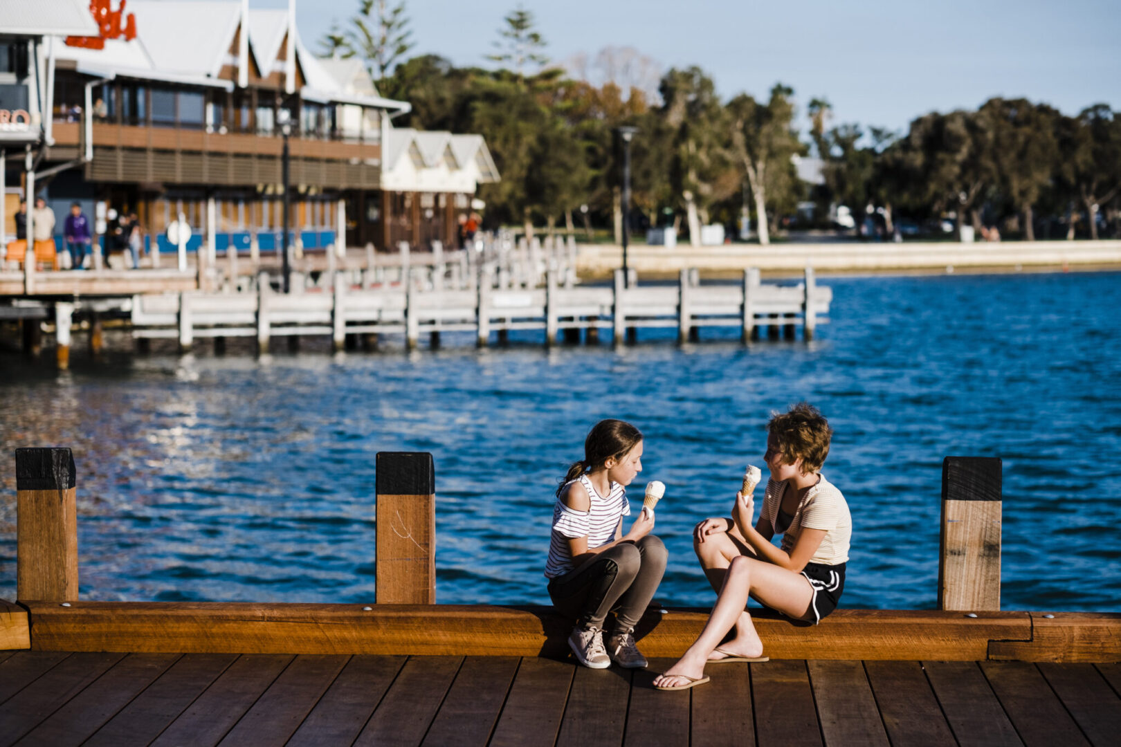 Kids enjoying ice cream, Mandjar Bay.